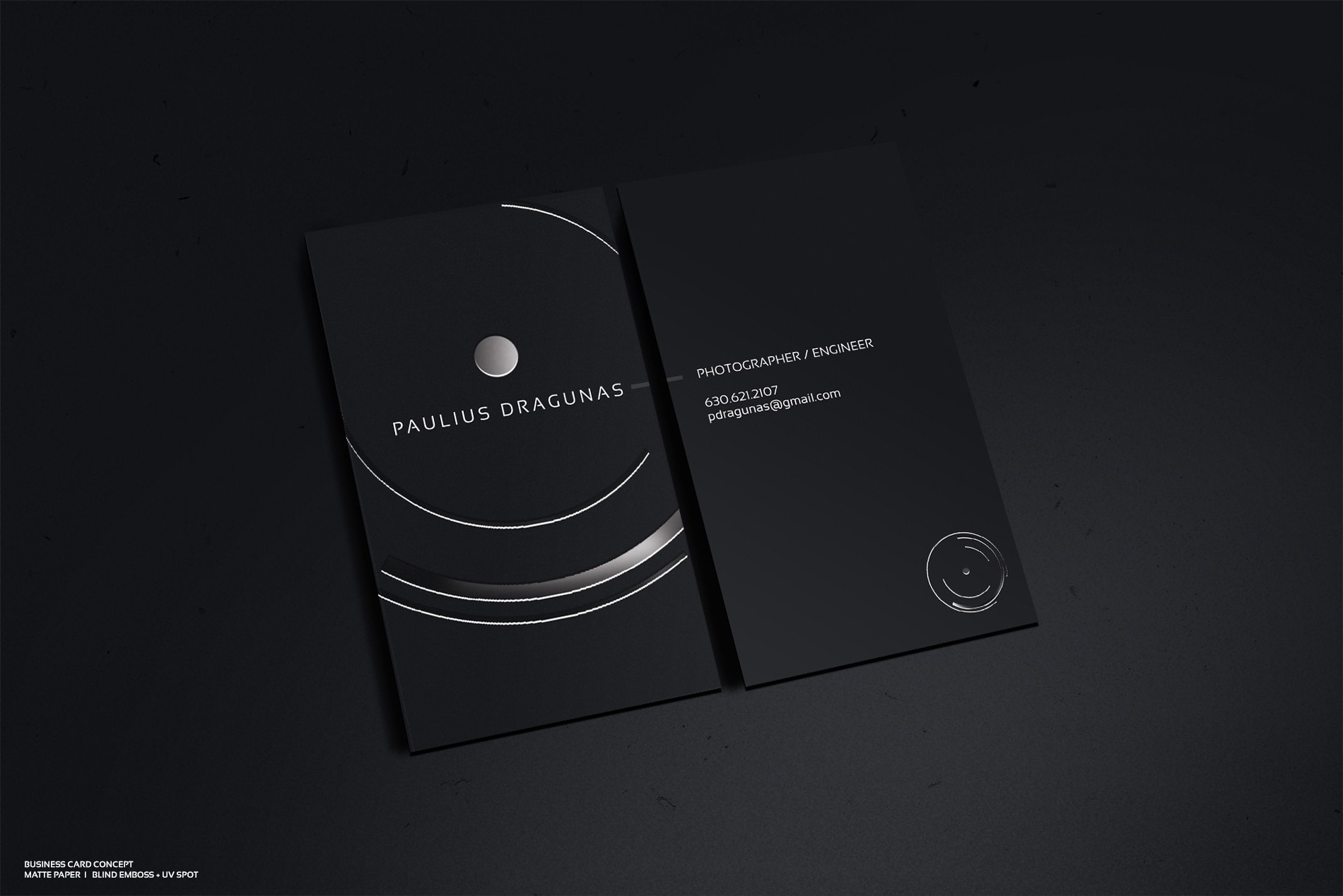 Black and silver business card for a photography brand