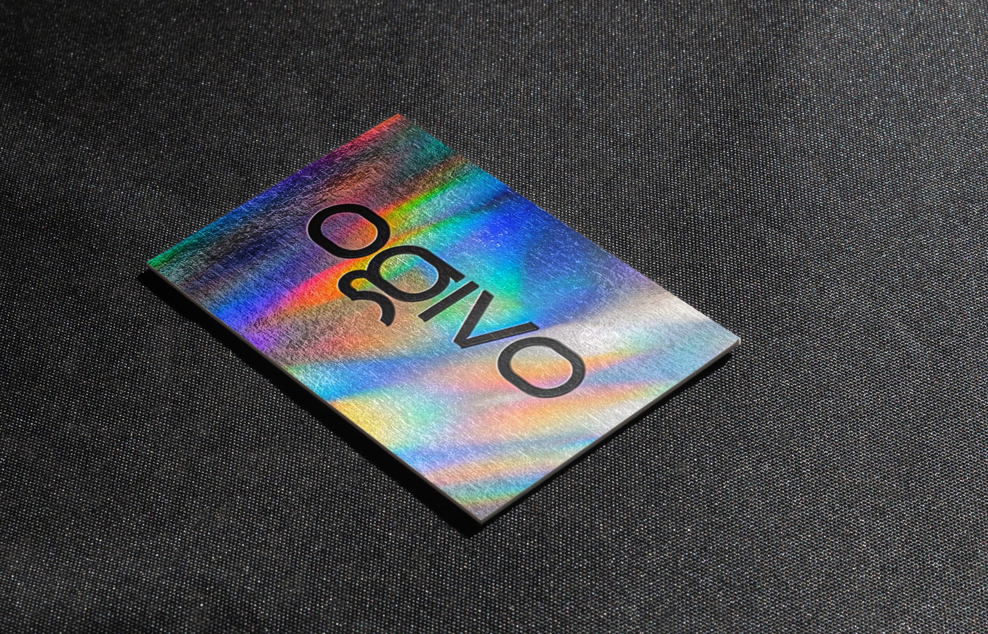 holographic business card with matte engraved text