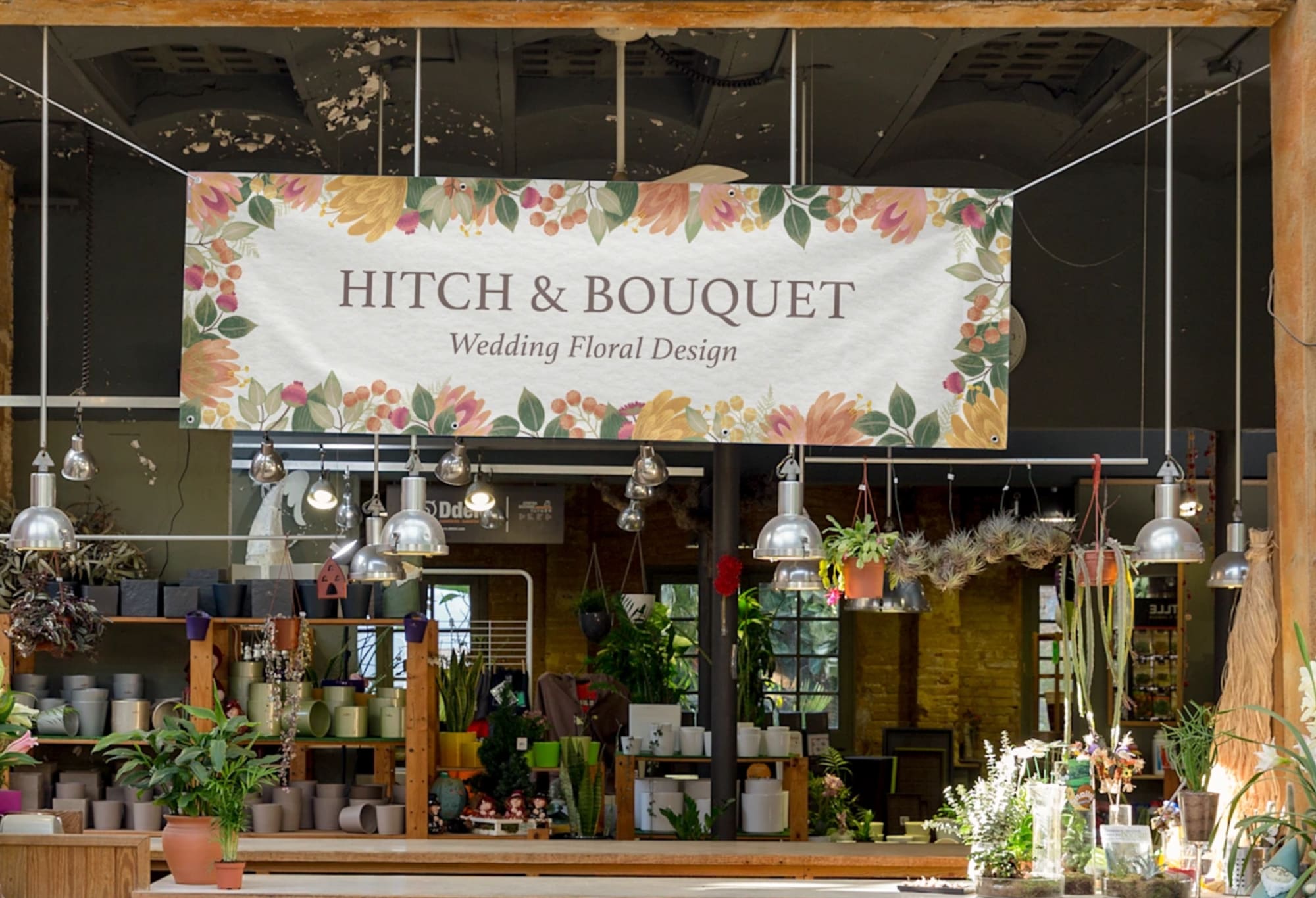 Über einem Blumenladen aufgespanntes Stoffbanner
