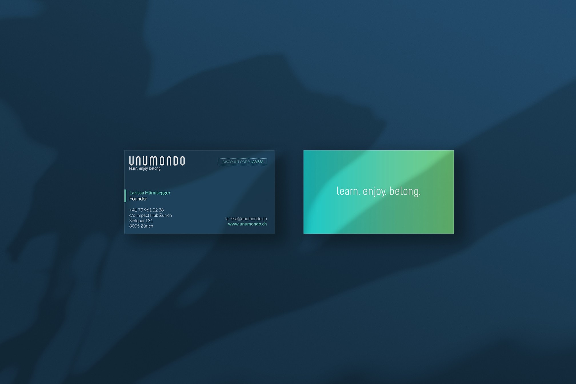 Blue and green business card design for an education brand