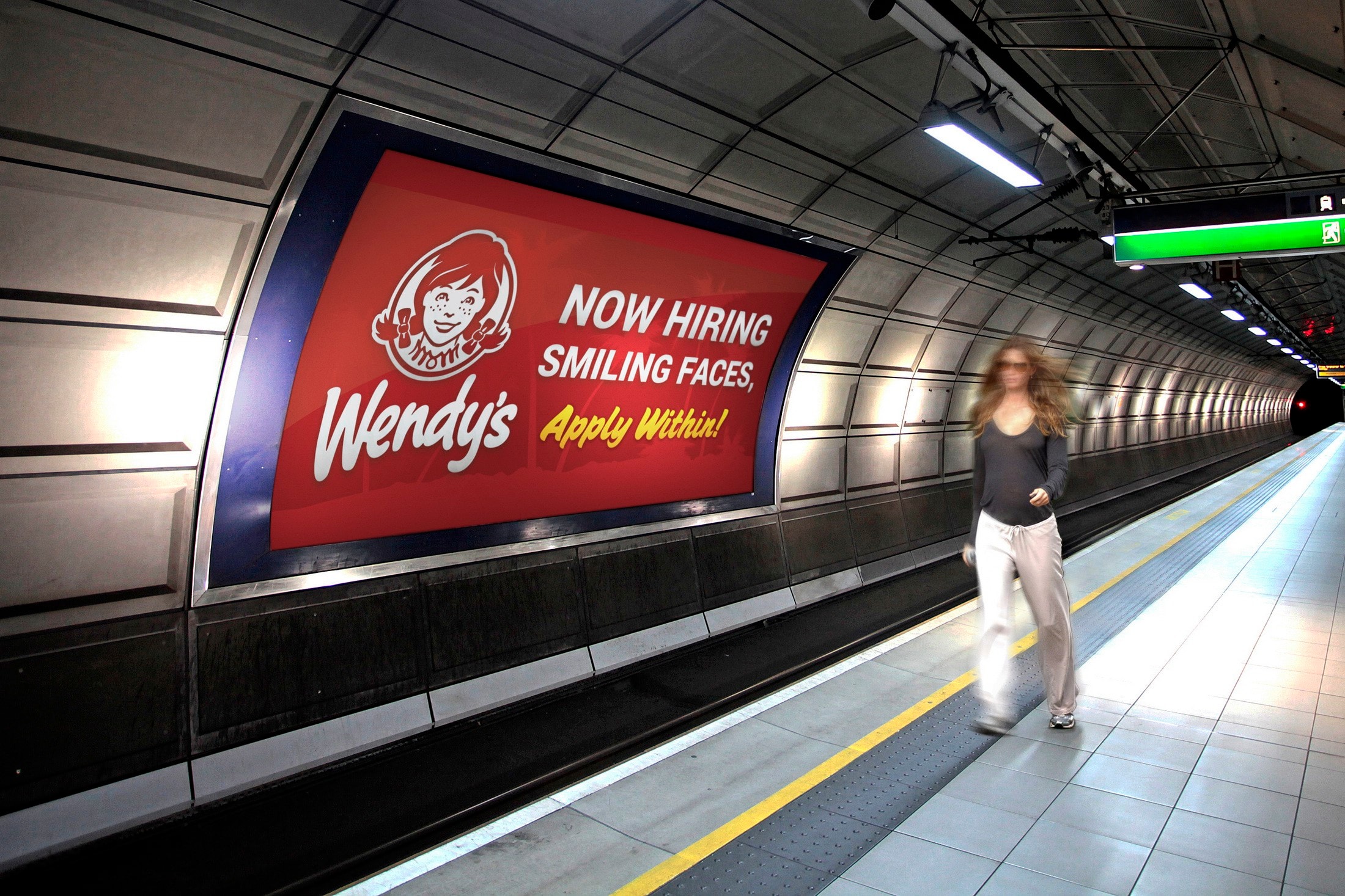 Three adverts on a London tube train