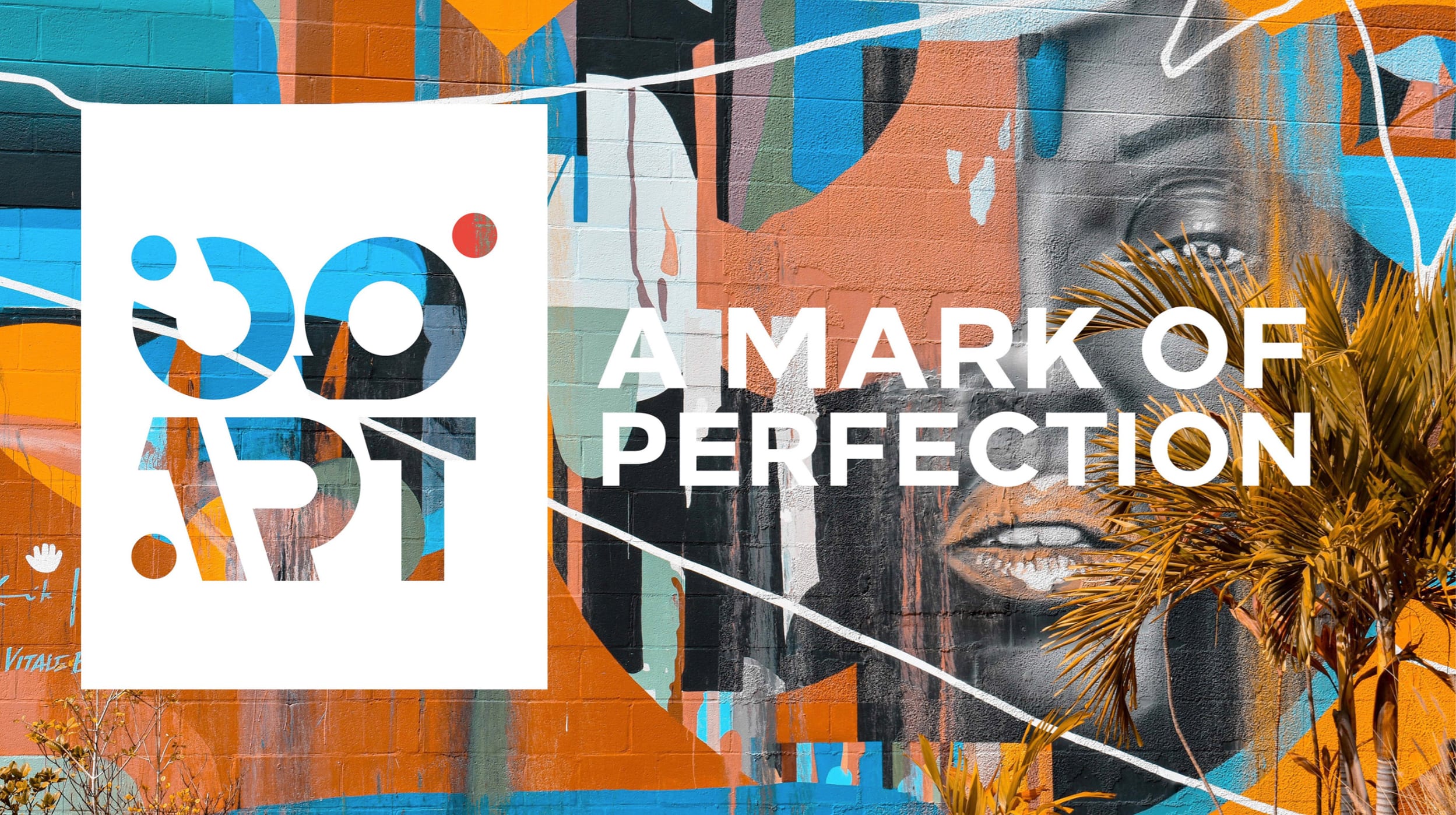 Logo d'une entreprise devant un mur recouvert d'une fresque murale