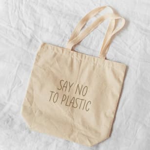 An eco-friendly tote bag design idea that says: &ldquo;Say no to plastic.&rdquo;