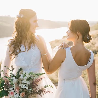 two brides celebrating a wedding in nature