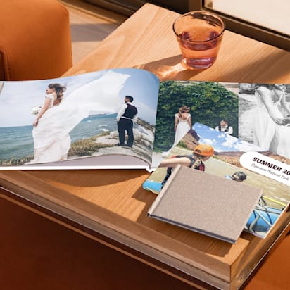 Collection of photo albums featuring wedding pictures and summer holiday pictures