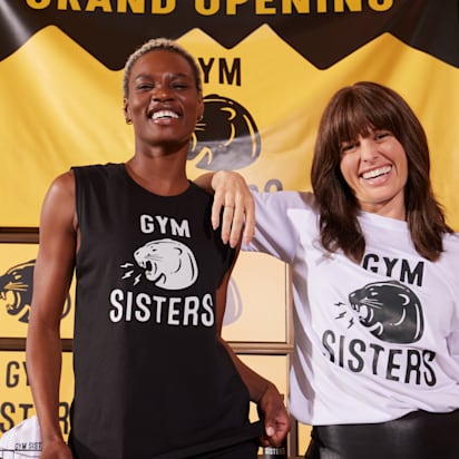 two friends wearing branded tshirts