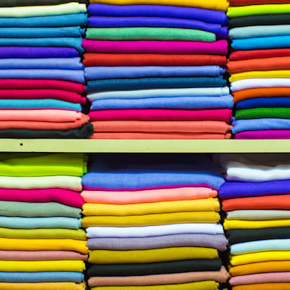 tshirt colors selection featuring a wide range of folded T-shirt colors for custom apparel and branding