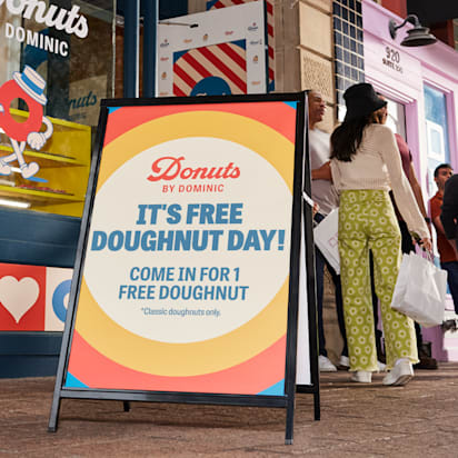 A-frame signage example promoting a limited-time offer at a doughnut shop