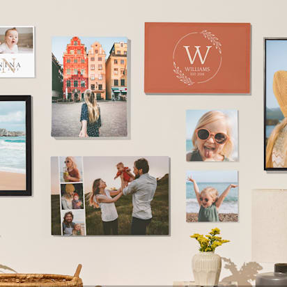 Different photo print sizes, displayed on a wall.