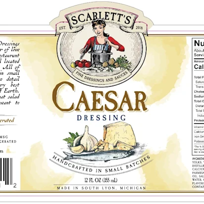 Vintage Caesar dressing label featuring a nutrition facts panel, ingredient list, barcode and handcrafted branding wrapped around a salad dressing bottle design.