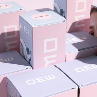 Custom packaging size guide featuring pink and blue branded product boxes in different shapes and dimensions