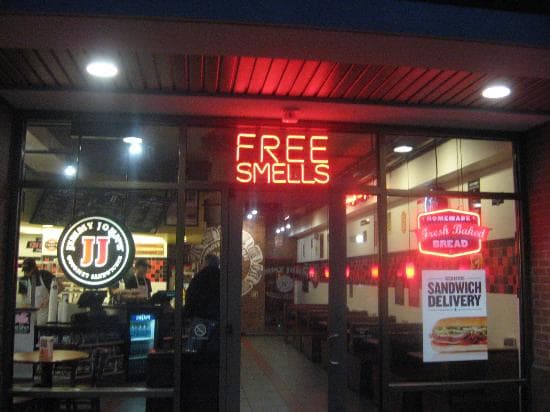 photo of a Jimmy John&rsquo;s featuring the &ldquo;FREE SMELLS&rdquo; sign