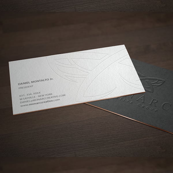 Fine line imprinted on business card for a subtle logo on the background