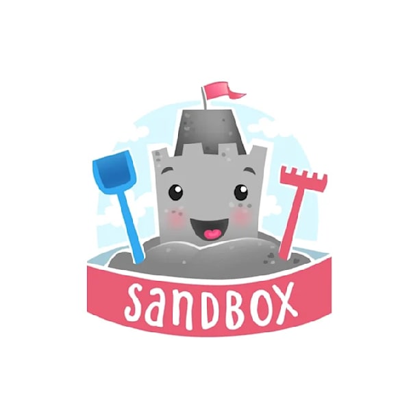 A sand castle mascot in a sandbox
