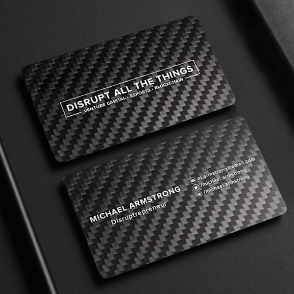 Black business card design with a textured surface