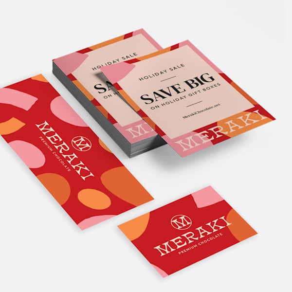 Branded flyers and business cards featuring typographic branding