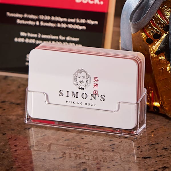 Illustration branding on a restaurant’s business cards, branding design examples