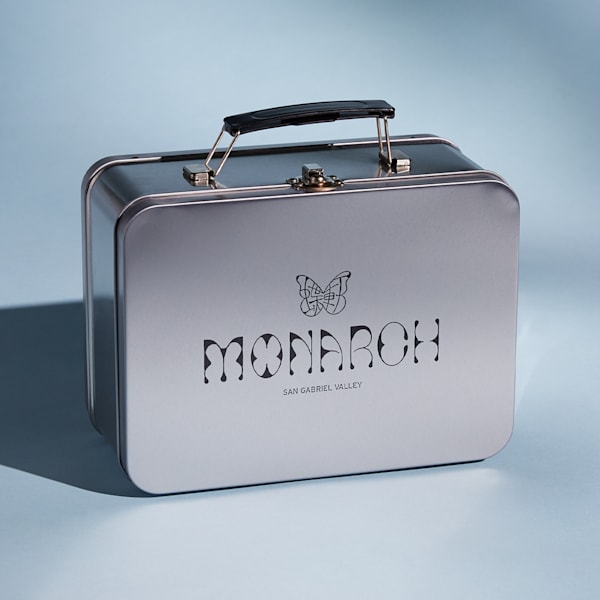 Branded lunch box with the brand logo engraved onto the metallic surface of the promotional product