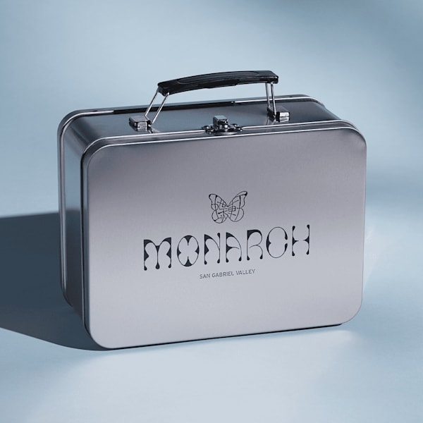 Branded lunch box with the brand logo engraved onto the metallic surface of the promotional product