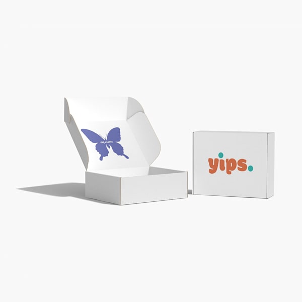 Minimalist packaging design featuring a clean white folding box with simple logo typography and subtle interior graphic.