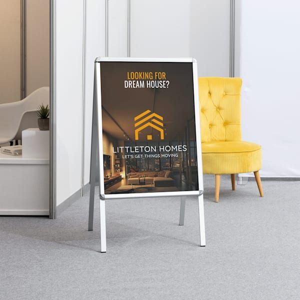 A-frame sign with the copy &ldquo;Looking for dream house?&rdquo;, brand logo and tagline &ldquo;Let&rsquo;s get things moving&rdquo;.