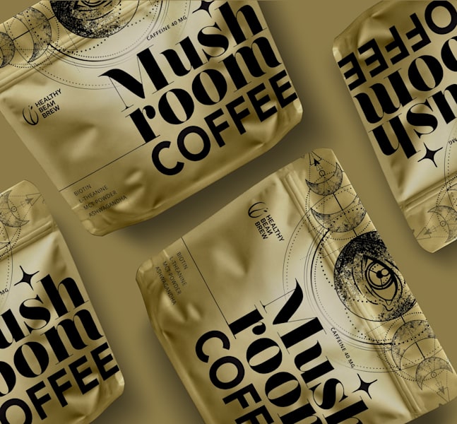 Gold coffee packaging with eye and moons drawn across