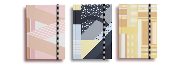 Three notebooks with geometric patterns