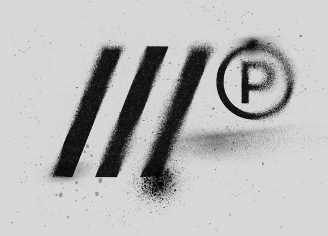 Brand logo with spray paint smudges tapping into the Etches and Imprints graphic design trend 2025