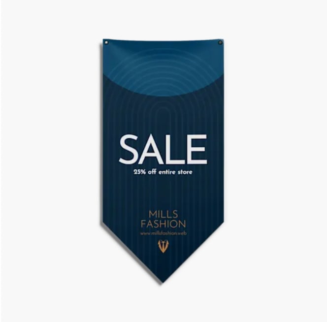 Dark-blue pennant banner advertising a sale hanging up on white wall