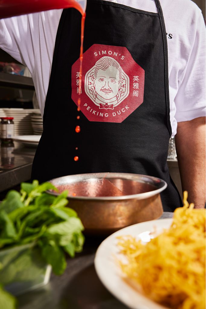 A custom apron with a logo