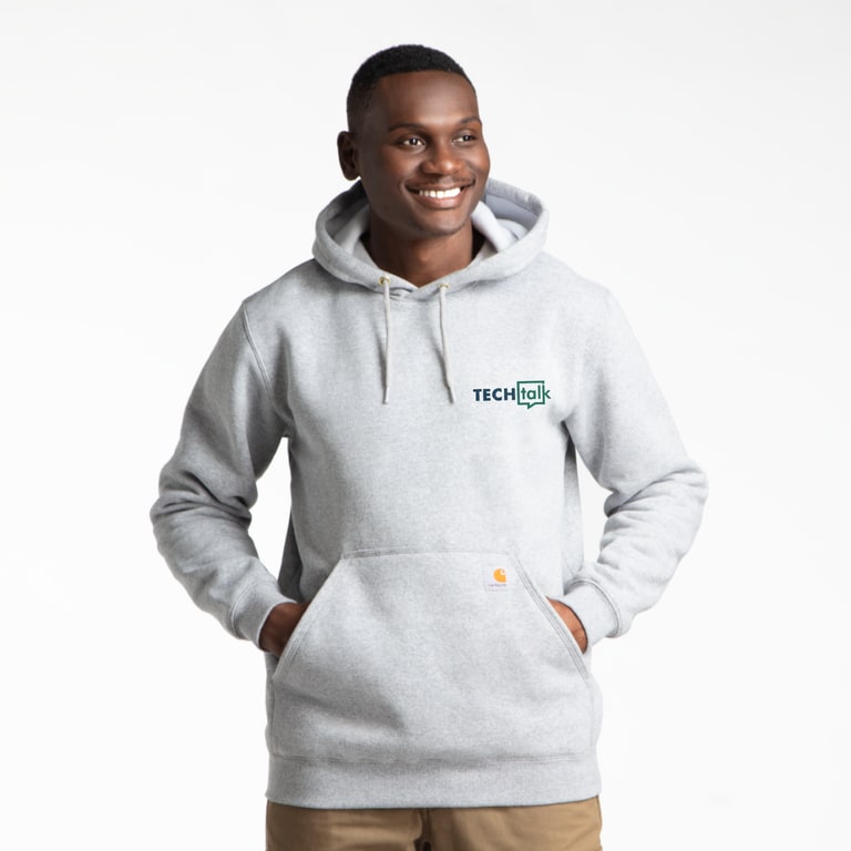 Man wearing a grey custom Carhartt hoodie.