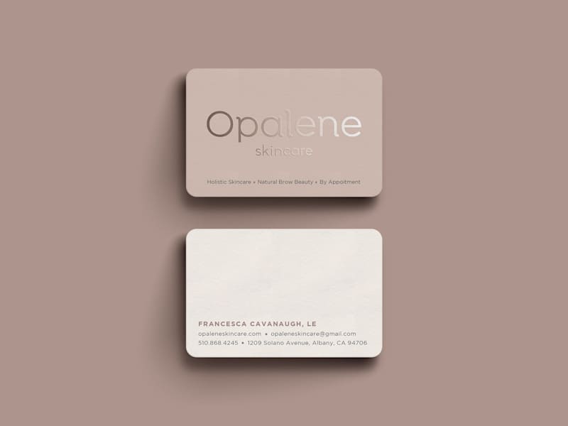 Minimalist business card for a skin care company with spot gloss details