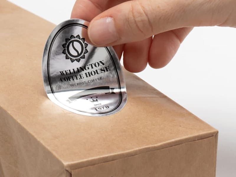 Branded silver foil sticker used on cafe packaging