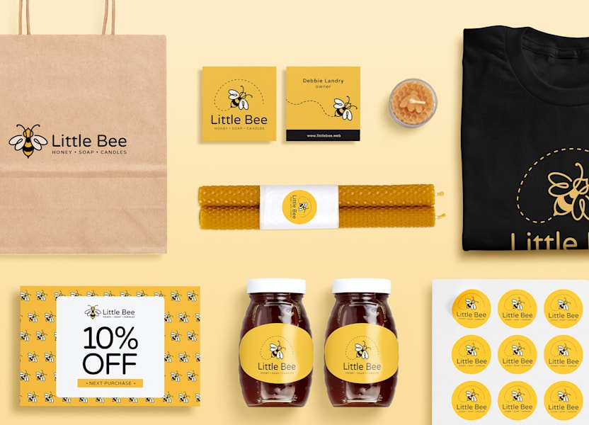 Branded product materials for Little Bee, including paper bag, brochures, jars, candles, t-shirt, stickers, and business cards – a visual example of how to market a product.