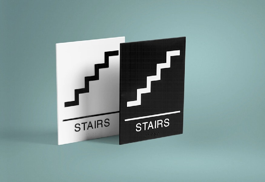 Wayfinding signs to indicate stairs