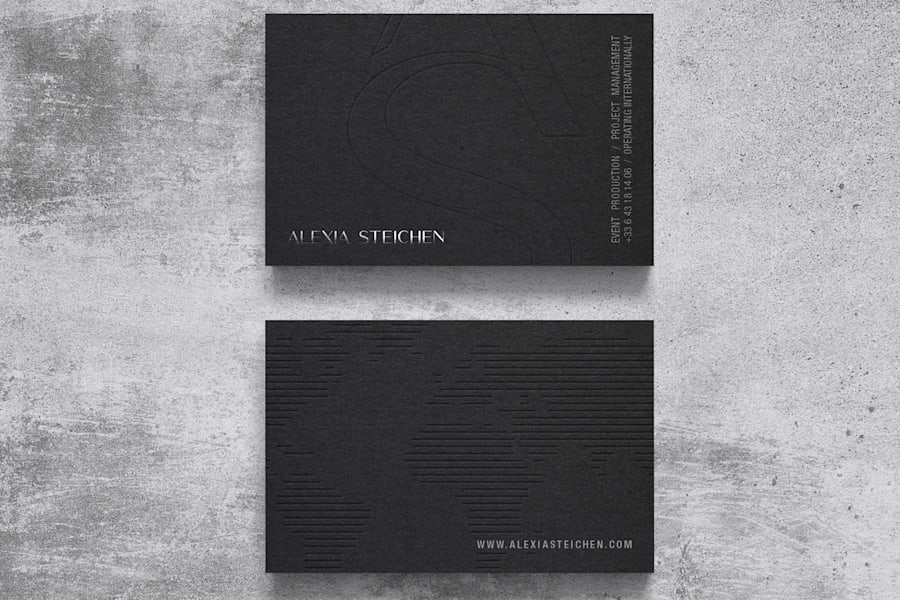 Letterpressed business card design with silver foil stamping