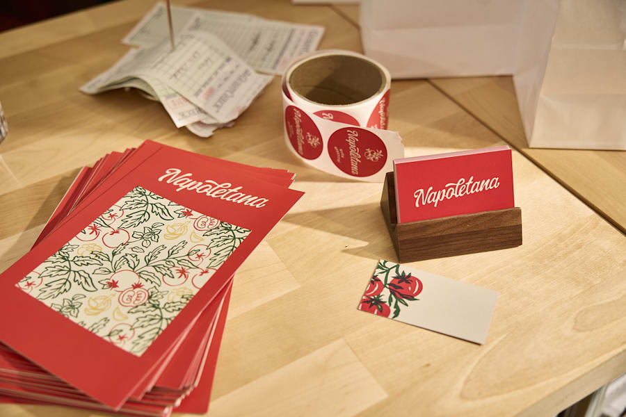 Branded menus, stickers and business cards using Napoletana’s brand imagery, colors, logo and fonts