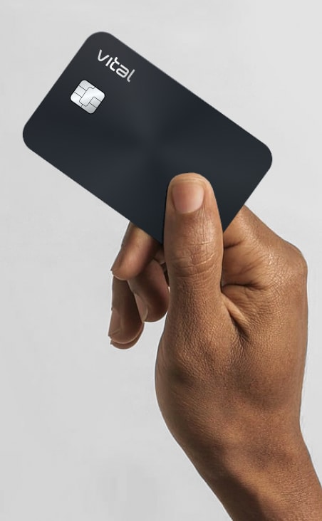 Hand holding Vital Card