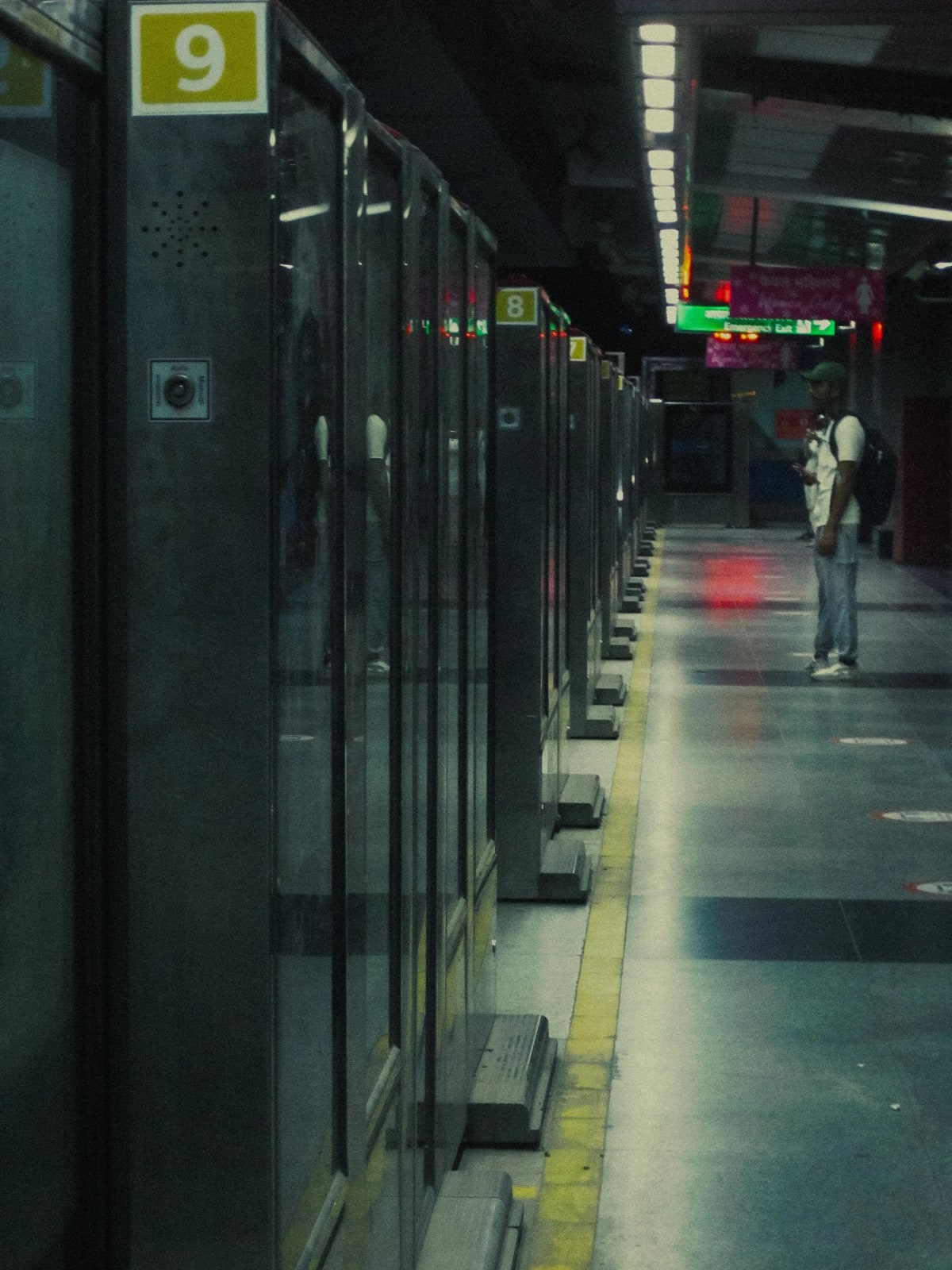 A man waiting for metro at Delhi metro station.