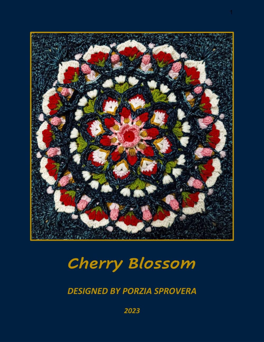 Cherry blossom mandala crochet square with red, pink, cream, gold and green petals on an indigo background