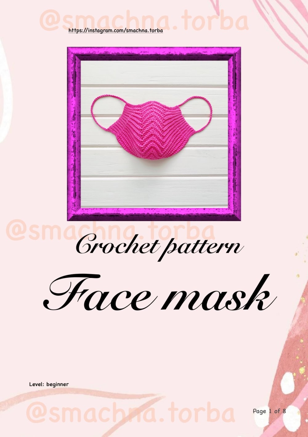 Bright pink crochet face mask with a zigzag ridge texture and chain ear loops on a frame