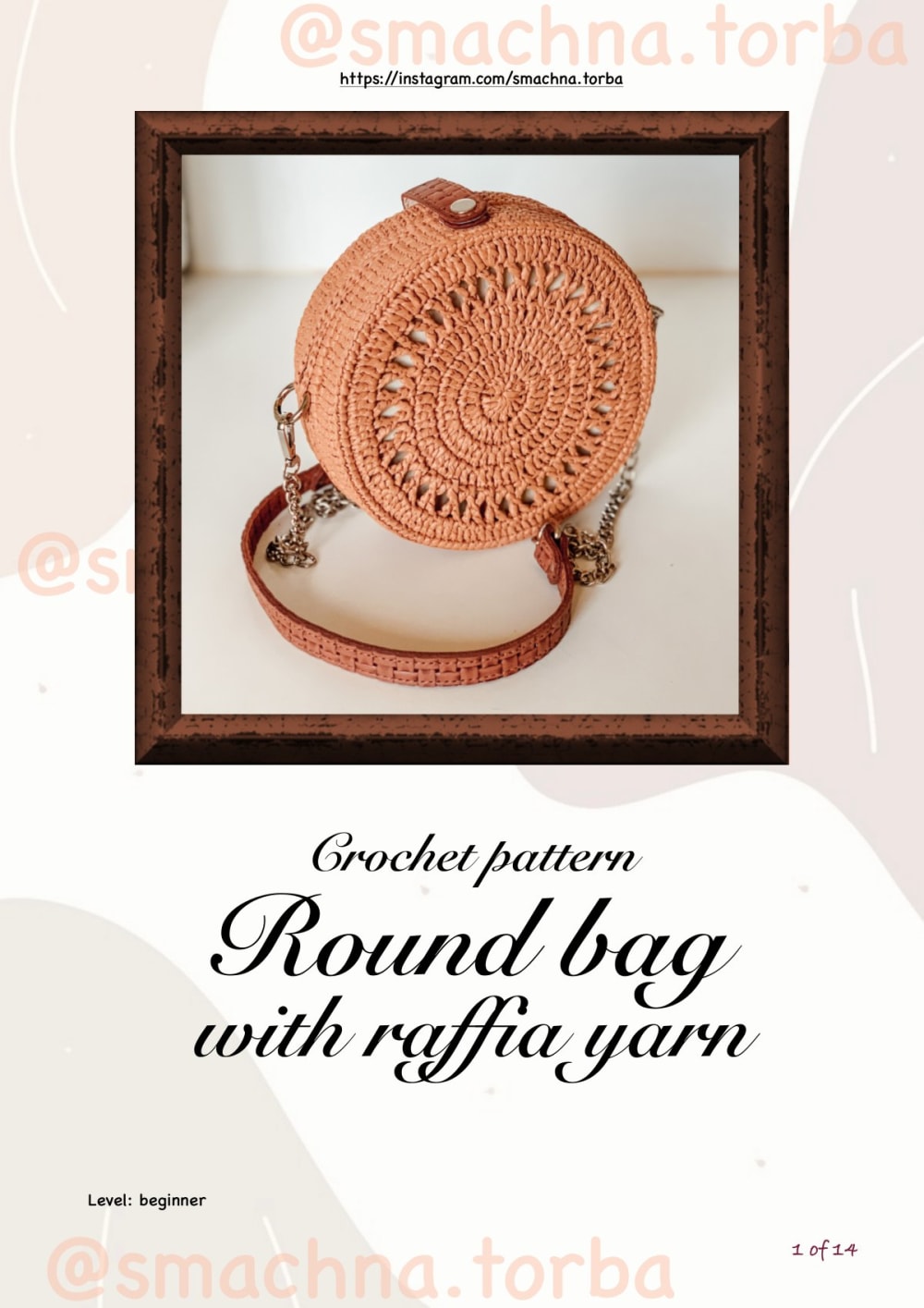 Terracotta round raffia crochet crossbody bag with a lace pattern and a chain shoulder strap