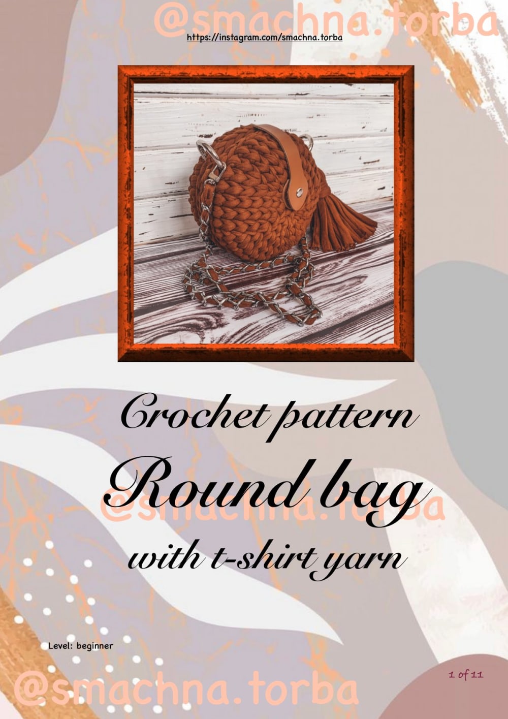 Rust brown crochet round bag with a tassel and a metal chain strap on a wooden background