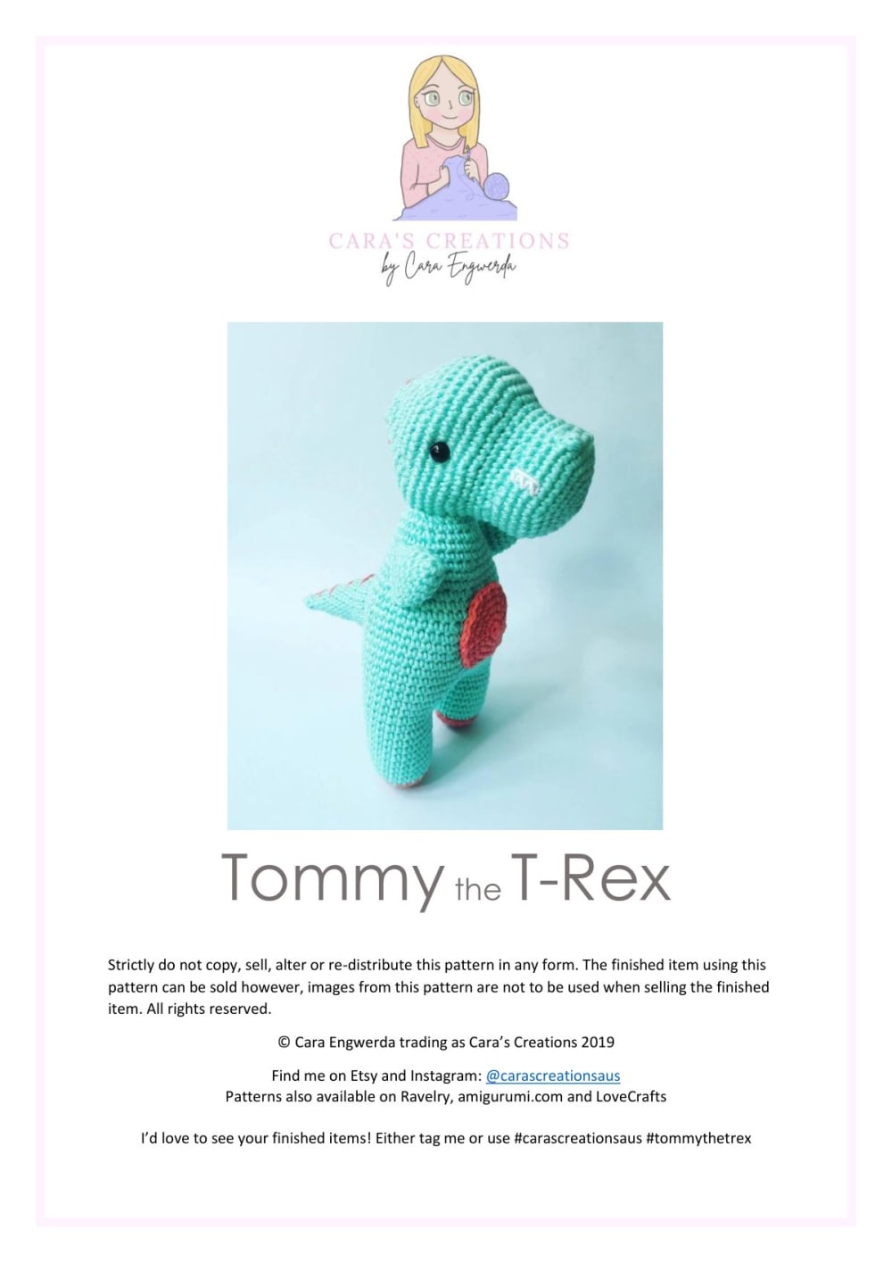 Mint green crochet T-Rex dinosaur toy with an orange belly