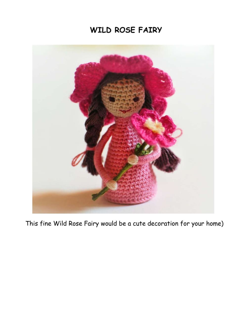 Tiny wild rose fairy doll in pink with a flower hat