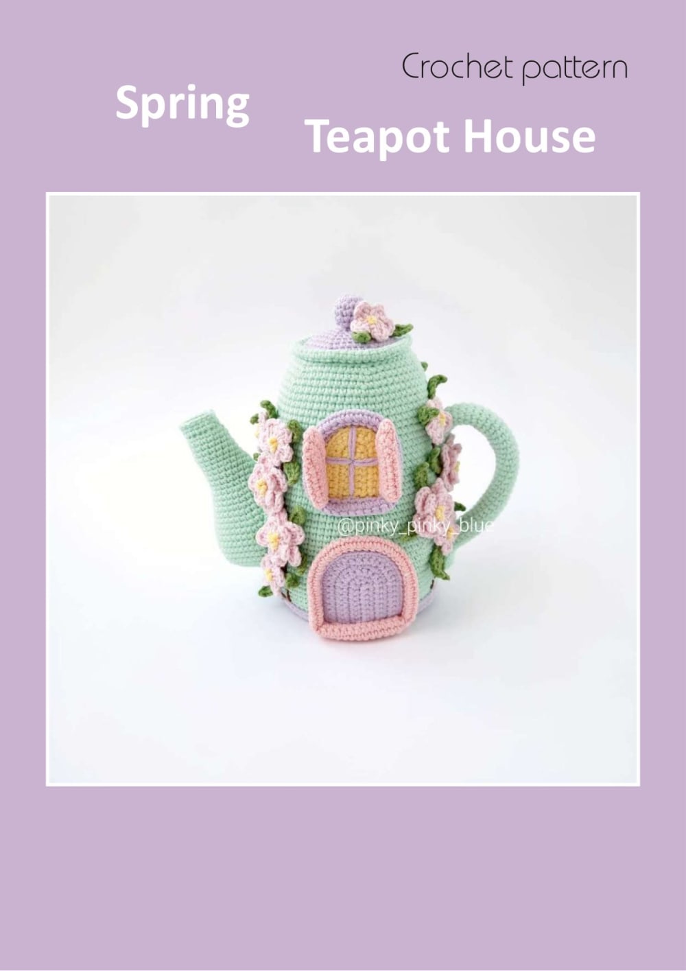 Mint green crochet teapot house with a pink door and flowers