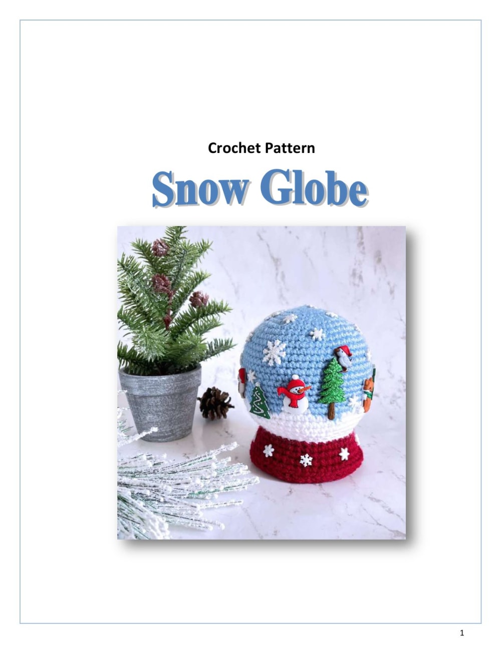 Crochet snow globe with a Christmas tree and snowman buttons on a burgundy base