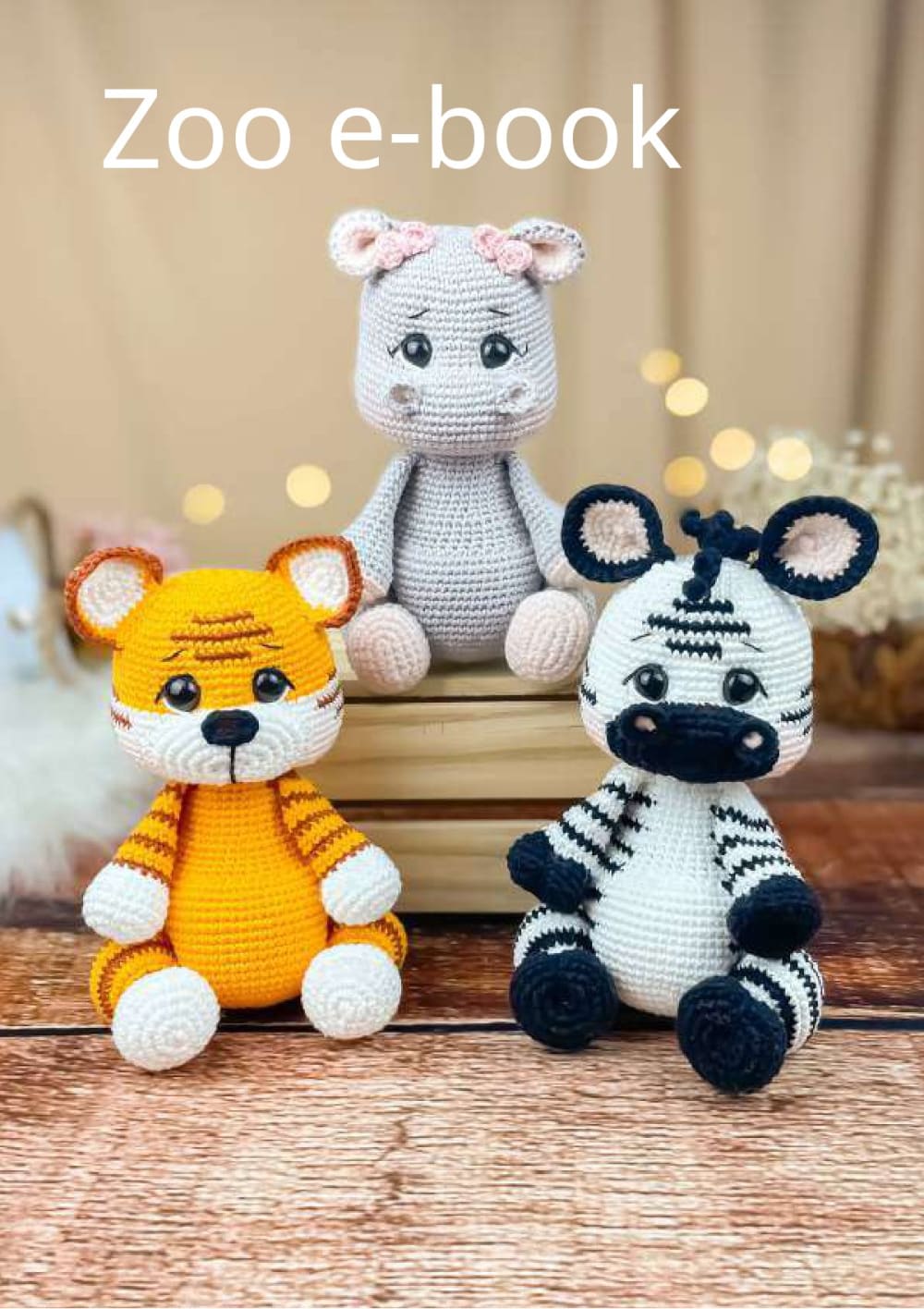 Crochet tiger, zebra and hippo amigurumi sitting together