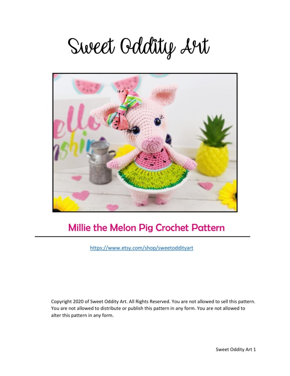 Millie the pink pig amigurumi wearing a watermelon hat next to a pineapple