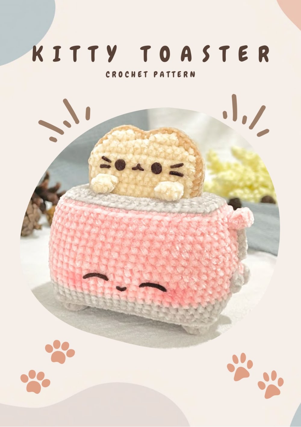 Pink crochet toaster with a cat-faced slice of bread